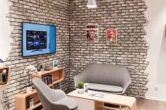 Steinwand im Handyshop